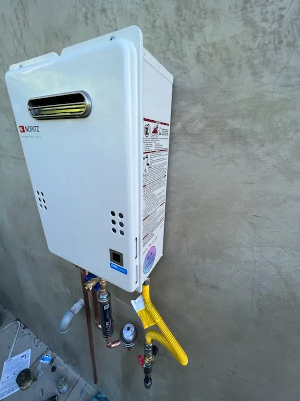 Tankless water heater installation for West Gate Addition homes